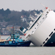 Illustration for article titled Drone Footage Shows Grounded Car Transporter In Rough Shape